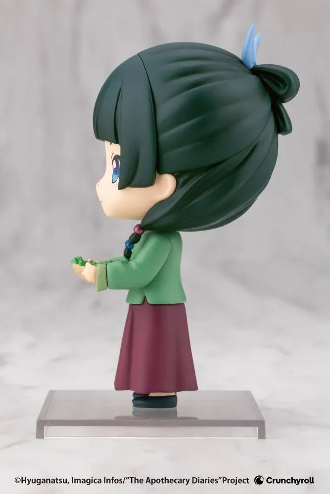 The Apothecary Diaries Oshi Works Mini Maomao Figure wearing a green outfit and holding a basket