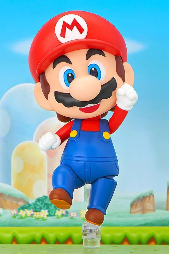 Super Mario Nendoroid Mario figure wearing his red hat and blue overalls in a running pose