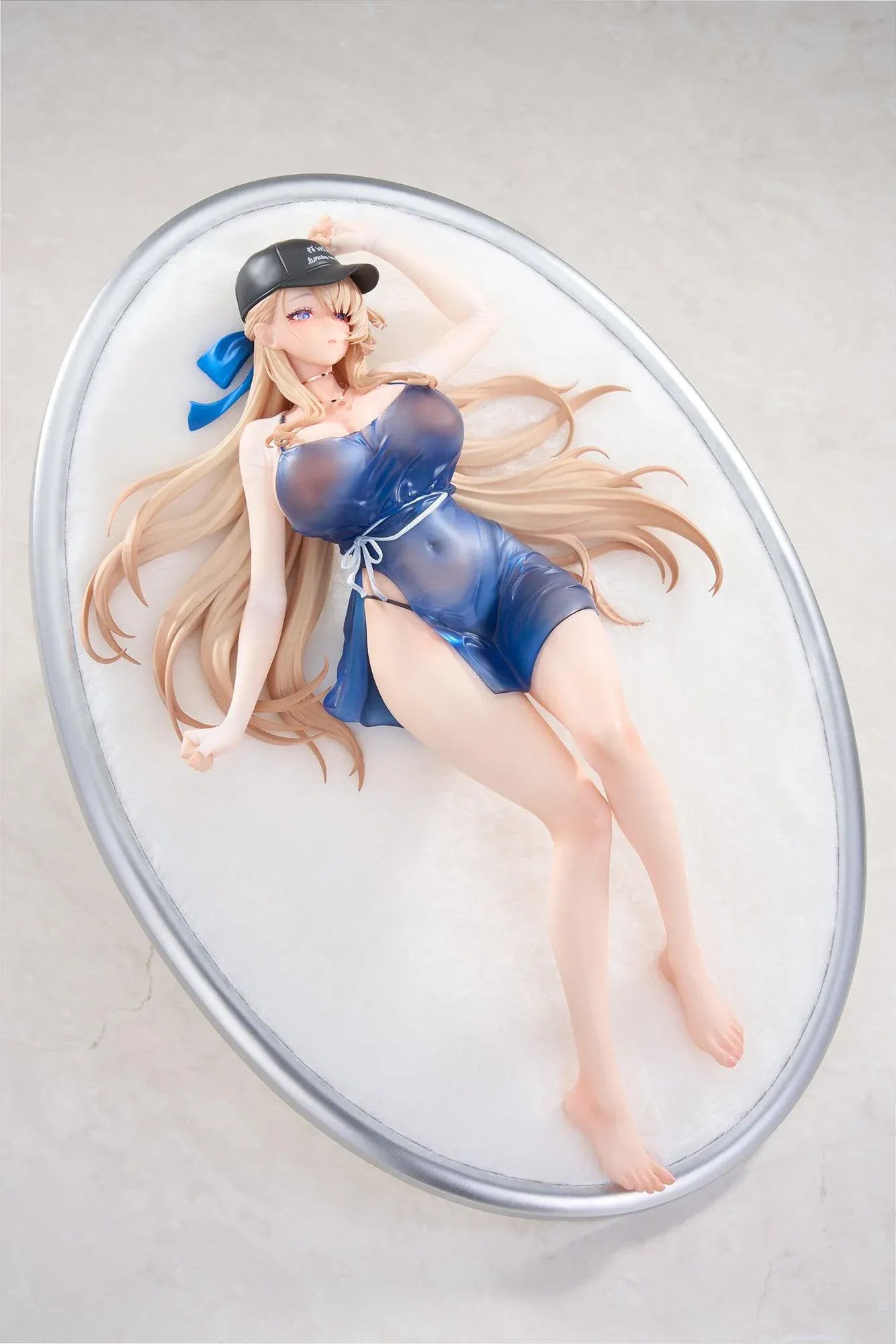 Brown Dust 2 Wilhelmina Water Park Queen 1/7 scale figure with bonus featuring Wilhelmina reclining on a cushion base in a translucent blue swimsuit with flowing blonde hair