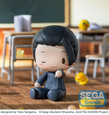 Chibi Suguru Geto Fuwa Petit figure sitting on a wooden floor in a classroom scene from Jujutsu Kaisen.