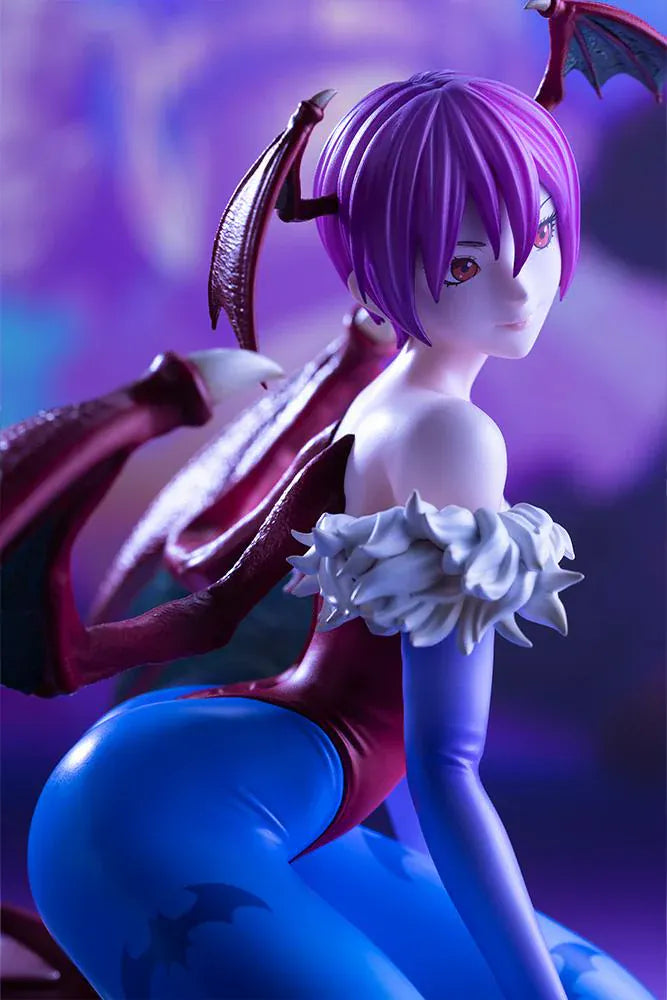 Darkstalkers Lilith 1/7 Scale Figure featuring Lilith with purple hair, bat wing accents, red-and-blue outfit details, and a playful seated pose.