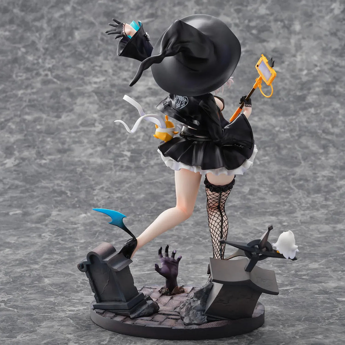Azur Lane Jade 1/6 scale figure with silver hair, a blue witch hat, and a black ruffled outfit posed above a detailed graveyard base.
