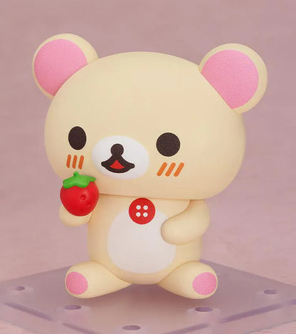 Rilakkuma Nendoroid Korilakkuma Figure with cream-colored bear design, pink ears, red button detail, white belly, and chibi display base