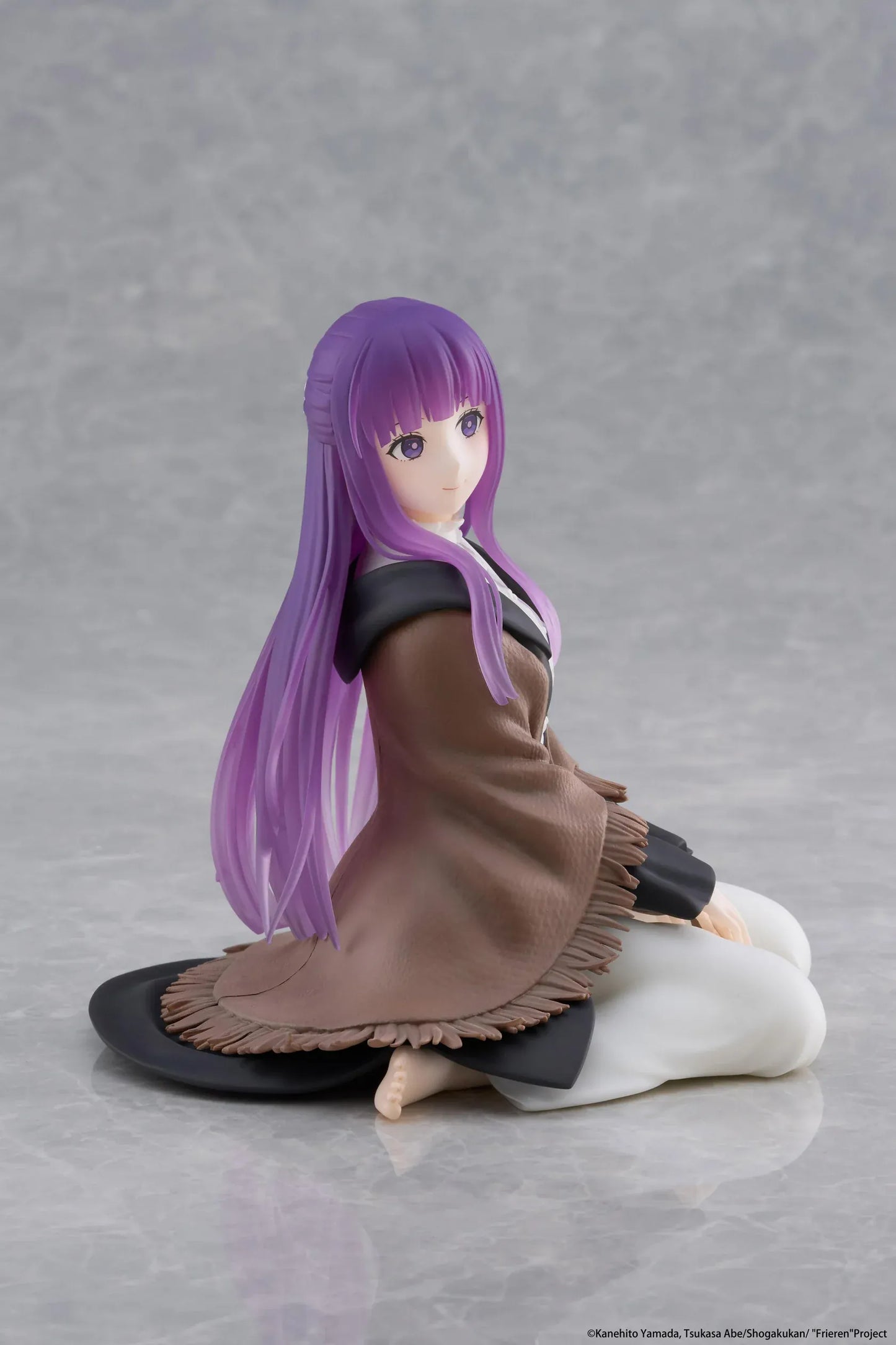 Frieren Beyond Journey's End Desktop Cute Fern Figure with purple hair wearing a shawl and white dress in a seated pose