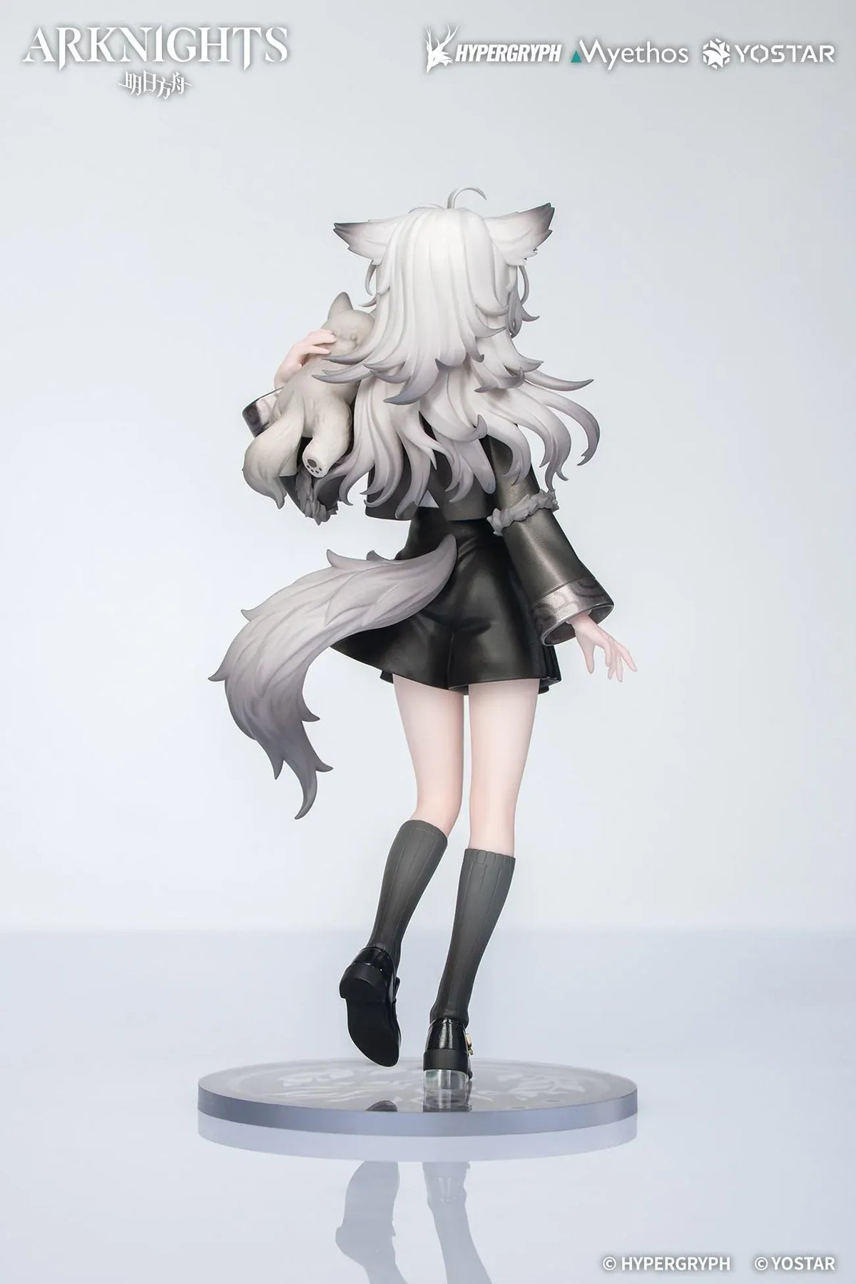Arknights Rhodes Kids Series Lappland figure wearing a black-and-white uniform and holding a small wolf companion.