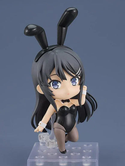 Rascal Does Not Dream of Bunny Girl Senpai Nendoroid Mai Sakurajima Bunny Girl Ver. (Rerelease) featuring a black-haired anime girl with blue eyes wearing a black bunny suit, bunny ears, sheer tights, white wrist cuffs, and a black bow tie.