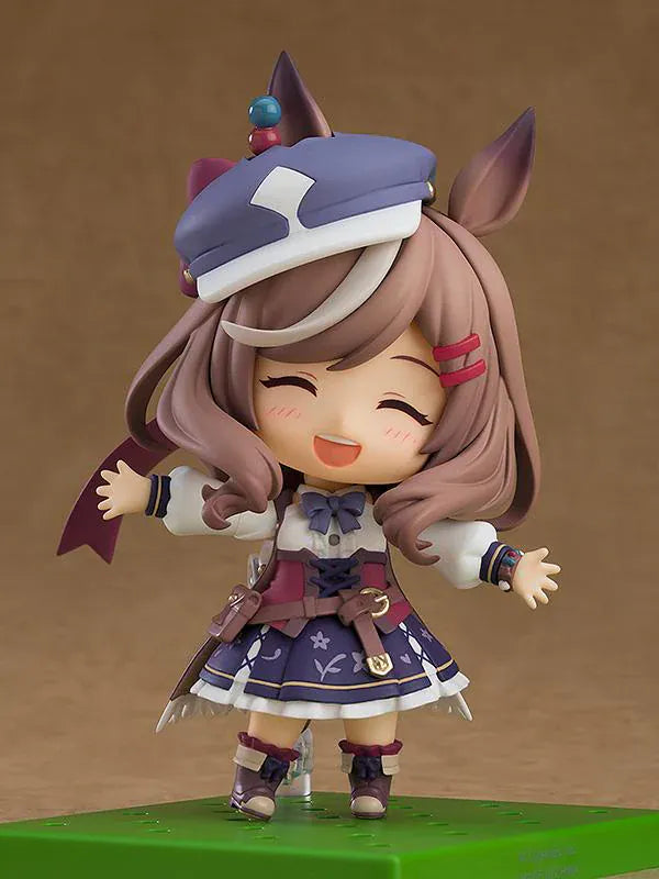 Umamusume Pretty Derby Nendoroid Matikanetannhauser Figure Rerelease featuring Matikanetannhauser with horse ears, brown hair, signature hat, race-inspired outfit, and cheerful pointing pose.