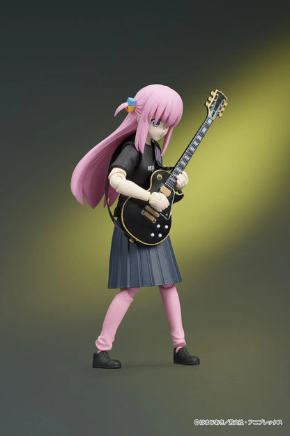 Bocchi the Rock! DIGACTION Hitori Gotoh figure holding a black and gold guitar, wearing a black band T-shirt, dark skirt, and pink leggings.