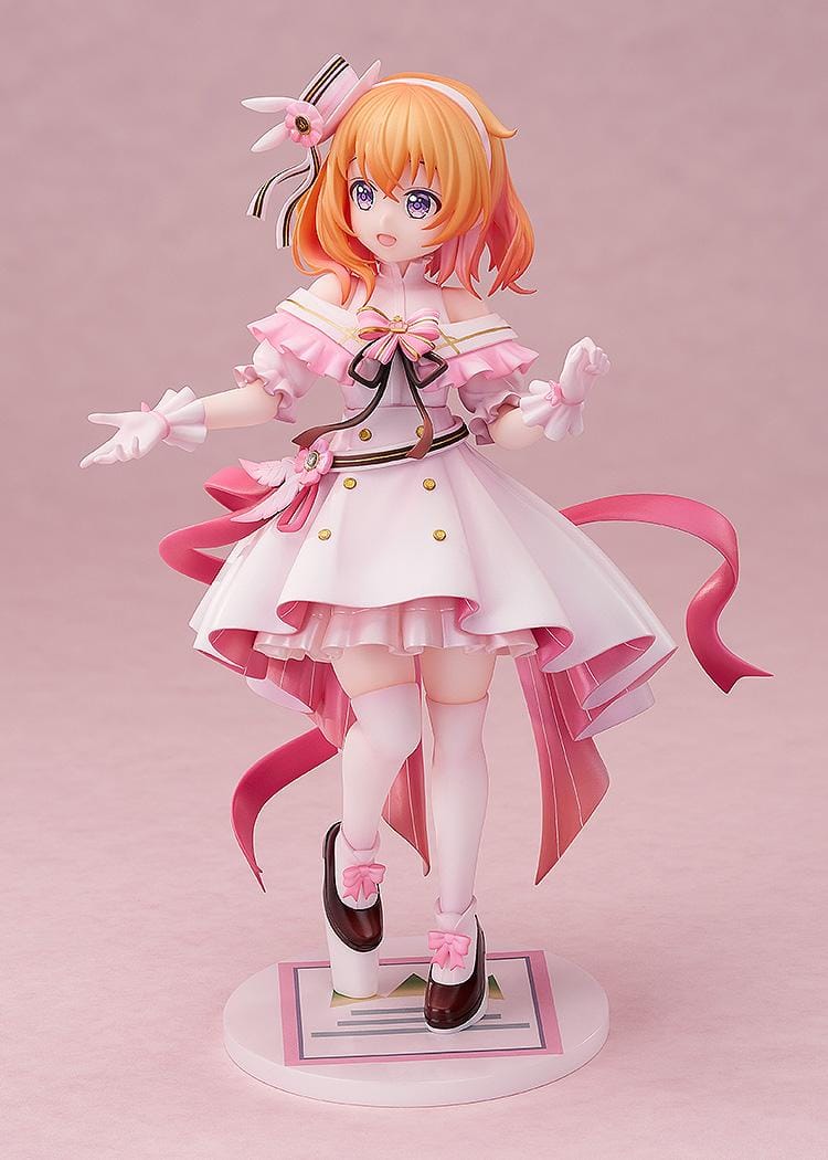 Is the Order a Rabbit Cocoa Dress Ver. 1/7 Scale Figure wearing an elegant pink and white frilled dress with ribbons and floral accessories