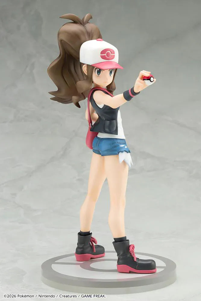 Pokemon ArtFX J Hilda with Tepig 1/8 Scale Figure Rerun featuring Hilda in her trainer outfit holding a Poké Ball with Tepig and flame effect on a display base.