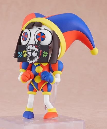 The Amazing Digital Circus Nendoroid Pomni Figure Rerelease featuring Pomni in a colorful red, blue, and yellow jester outfit with oversized hat and mismatched shoes.
