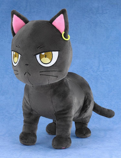The Classroom of a Black Cat and a Witch Plushie Claude featuring Claude as a soft black cat plush with golden embroidered eyes, pink inner ears, and serious expression.