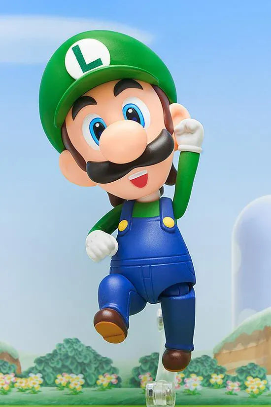 Super Mario Nendoroid Luigi figure wearing his green hat and blue overalls in a running pose
