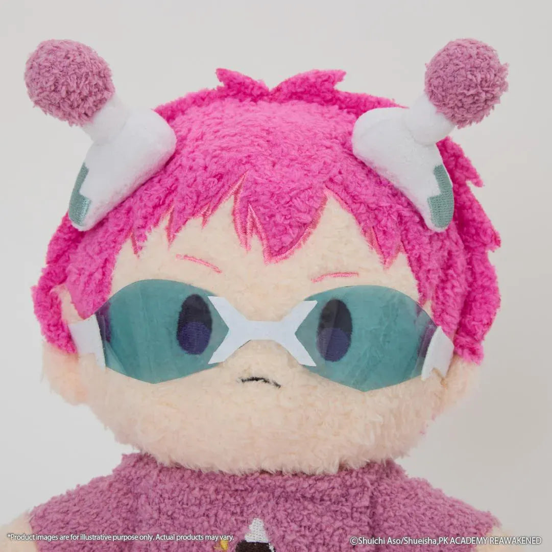 The Disastrous Life of Saiki K. Kusuo Saiki Fukamokogurumi Plushie featuring bright pink hair, green-tinted glasses, white psychic limiters with pink pom-poms, and a fluffy pink outfit with an embroidered coffee jelly design in a cute seated pose.