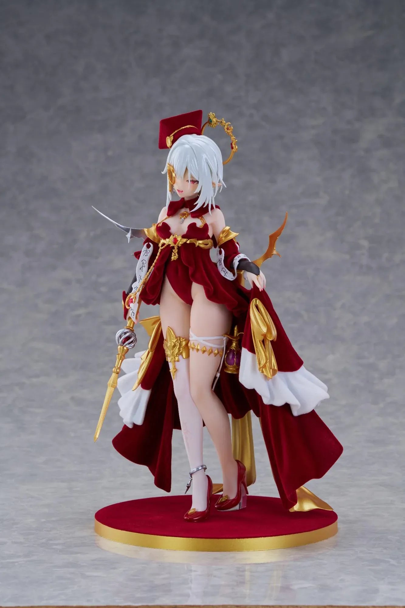 Alchemist Formal Dress Ver. 1/7 Scale Figure featuring a white-haired character in a red formal dress with gold accessories, ornate staff, cape, and red display base.