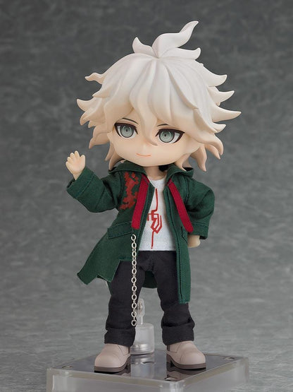 Danganronpa 2x2 Nendoroid Doll Nagito Komaeda with white hair, a dark green fabric coat, black trousers, gray shoes, and a silver-colored chain.