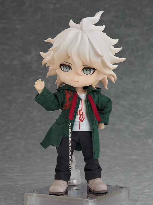Danganronpa 2x2 Nendoroid Doll Nagito Komaeda with white hair, a dark green fabric coat, black trousers, gray shoes, and a silver-colored chain.