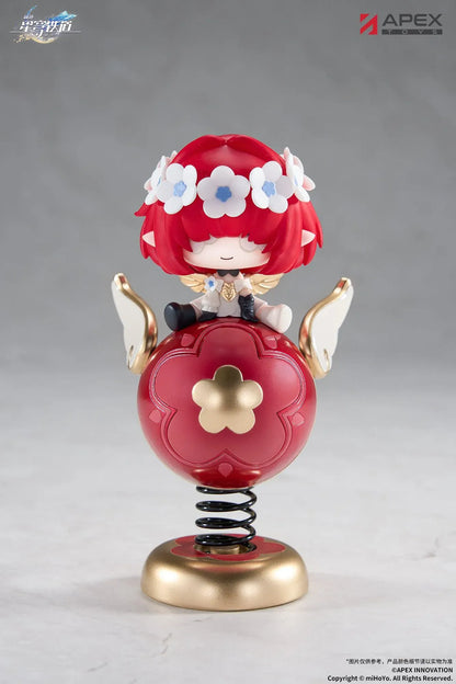 Honkai Star Rail Tribbie Chibi Chara Yurayura Stand Non-Scale Figure with red hair, flower details, red-and-gold spring base, and chibi design