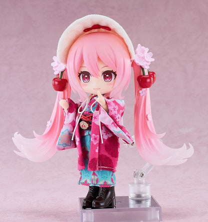 Hatsune Miku Nendoroid Doll Sakura Miku Hirohako 2025 Ver. Hakodate featuring Sakura Miku with pink twin tails, cherry accessories, and a colorful kimono-style outfit.