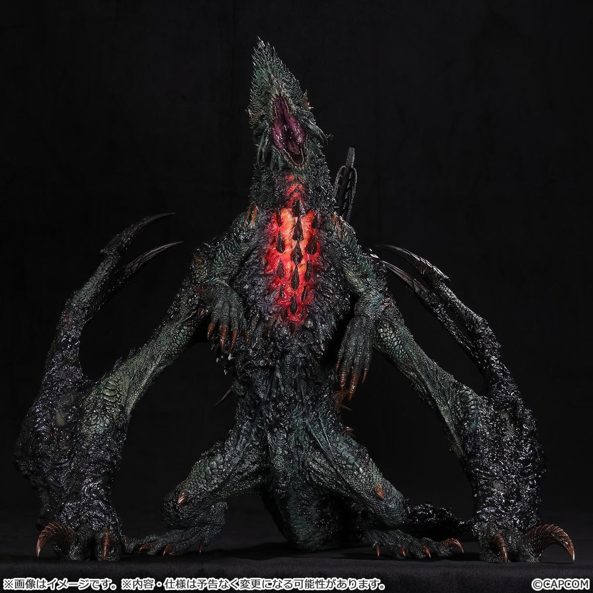 Monster Hunter Gogmazios Creator's Model XL figure roaring with dark textured scales, jagged spines, large claws, and red-orange chest accents.