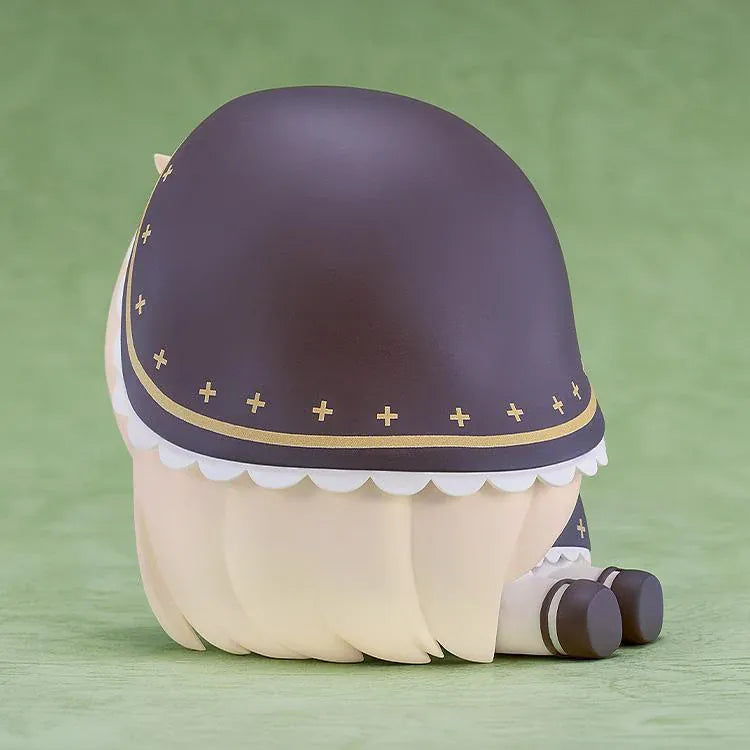 POP UP PARADE Petite Speaki figure with blonde hair, sparkling eyes, rosy cheeks, and a dark hood with gold accents and a skull detail.