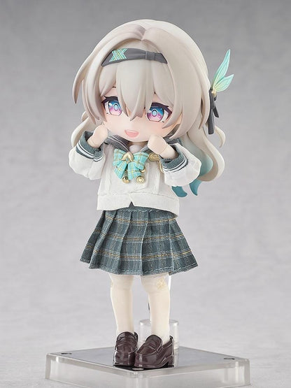 Honkai Star Rail Nendoroid Doll Firefly Spring Missive Ver. featuring silver-blonde hair, colorful eyes, a white sailor-style blouse, green plaid skirt, matching bow, cream knee-high socks, brown loafers, and a brown shoulder bag.