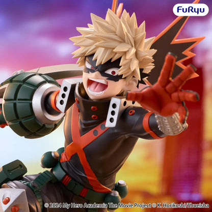 Katsuki Bakugo Muchute figure in his hero costume performing a dynamic airborne attack pose with grenade-shaped gauntlets.