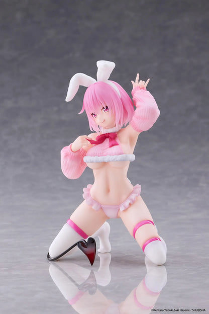 To Love-Ru Darkness MOFLOCK Momo Fluffy Bunny Ver. Figure featuring a pink-haired anime girl with pink eyes, white bunny ears, a pink fluffy bunny outfit, matching sleeves, white thigh-high stockings, and a black devil tail in a playful kneeling pose.