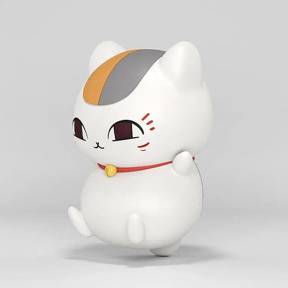Nyanko Sensei Huggy Good Smile figure with a white body, colorful head markings, red collar, and golden bell.
