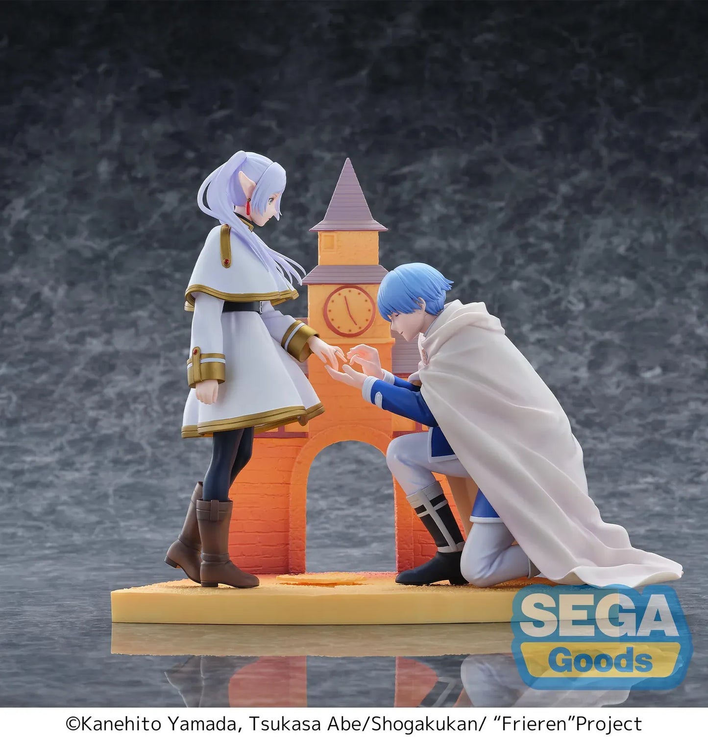 Frieren Beyond Journey's End Luminasta Frieren Eternal Love Figure with white and gold outfit and scenic building backdrop