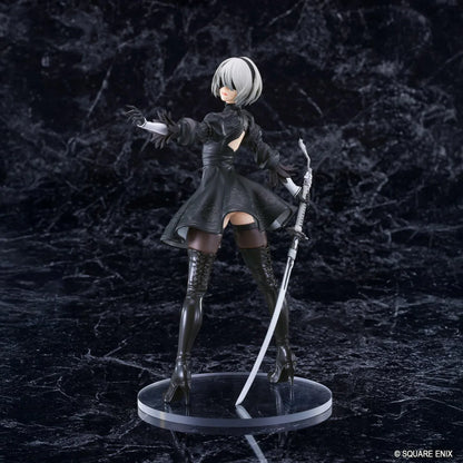 NieR POP UP PARADE 2B YoRHa No.2 Type B L Size Figure featuring a silver-white-haired android wearing a black gothic combat dress, thigh-high boots, and black gloves while holding a large sword on a circular display base.