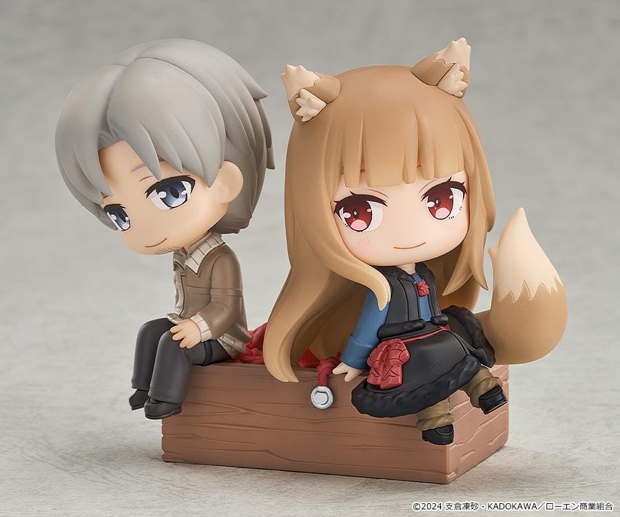 Spice and Wolf Mini Memory Lawrence and Holo chibi figure set sitting on a wooden crate base