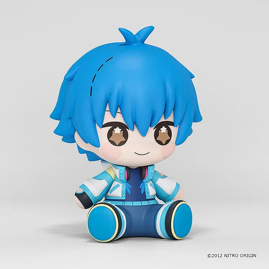 DRAMAtical Murder Huggy Good Smile Aoba figure with blue hair, star-filled eyes, headphones, and a blue-and-white outfit in a seated pose.