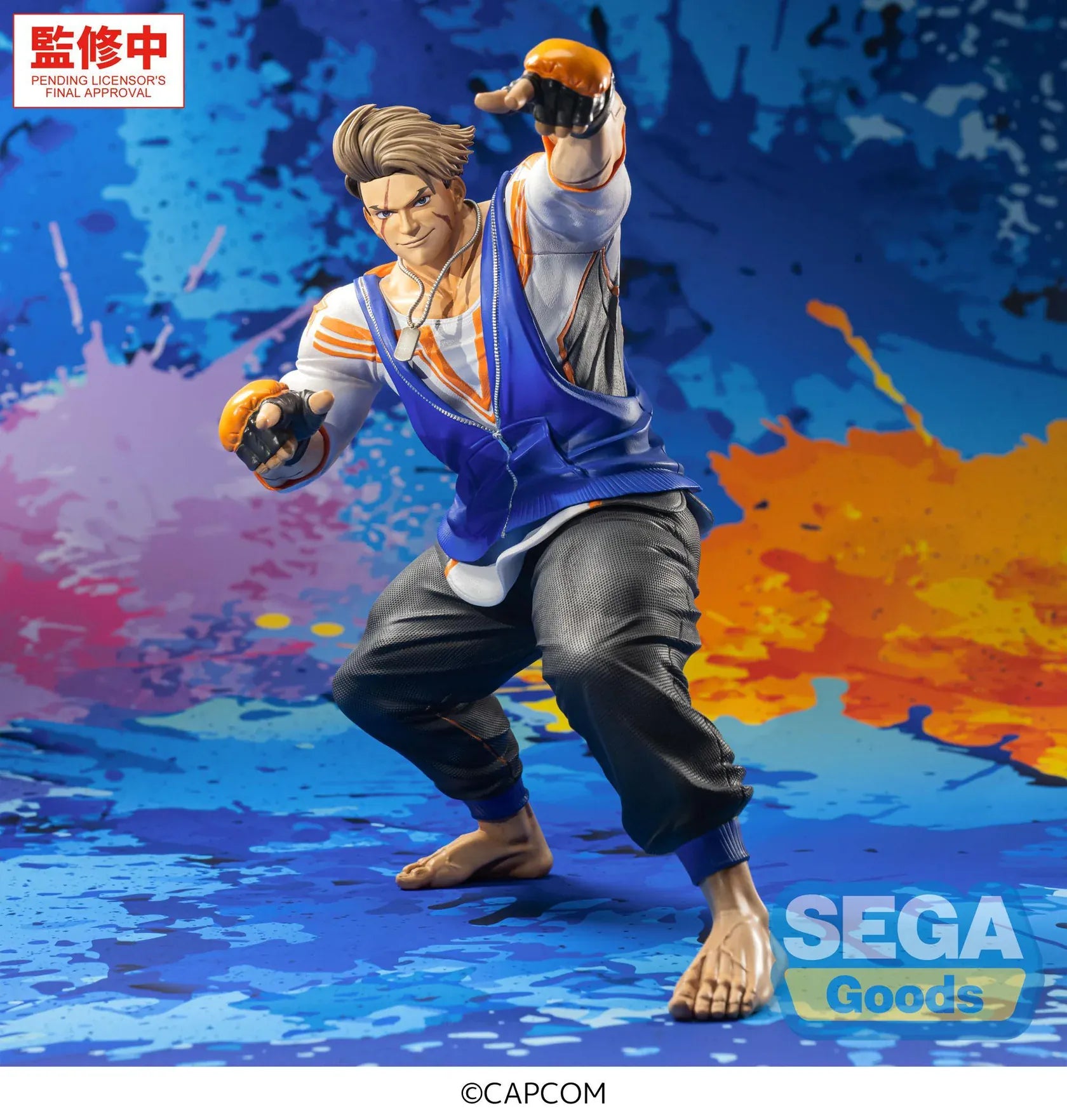 Street Fighter 6 FiGURiZMa Luke Figure in a dynamic fighting stance with blue and orange outfit and fingerless gloves