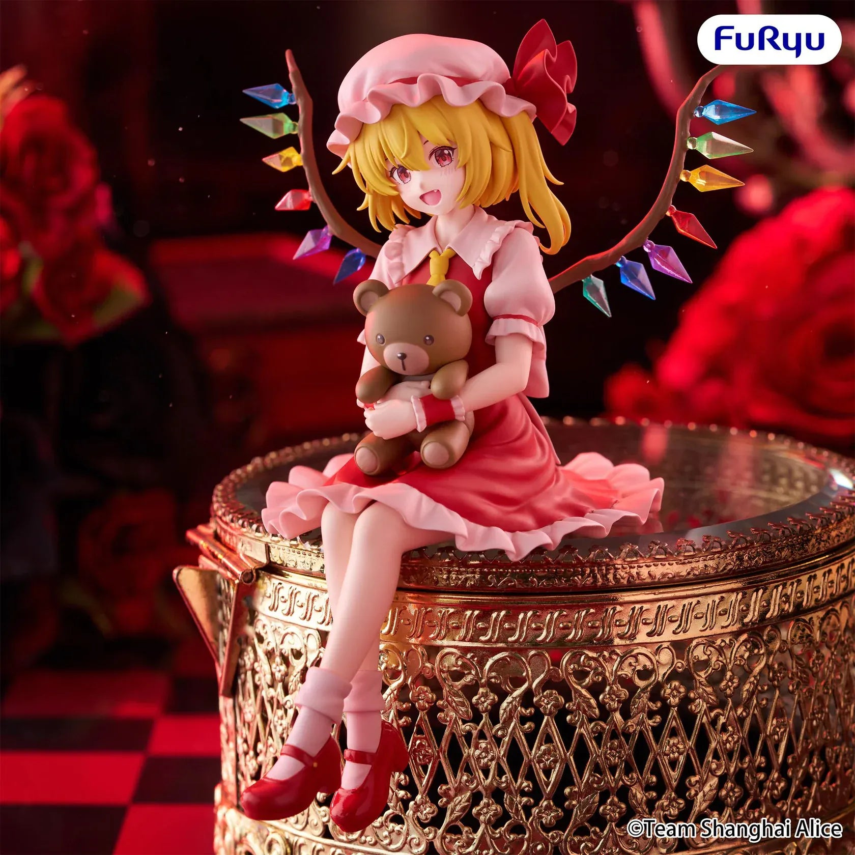 Touhou Project Flandre Scarlet Noodle Stopper figure holding a teddy bear with colorful crystal wings and a seated pose