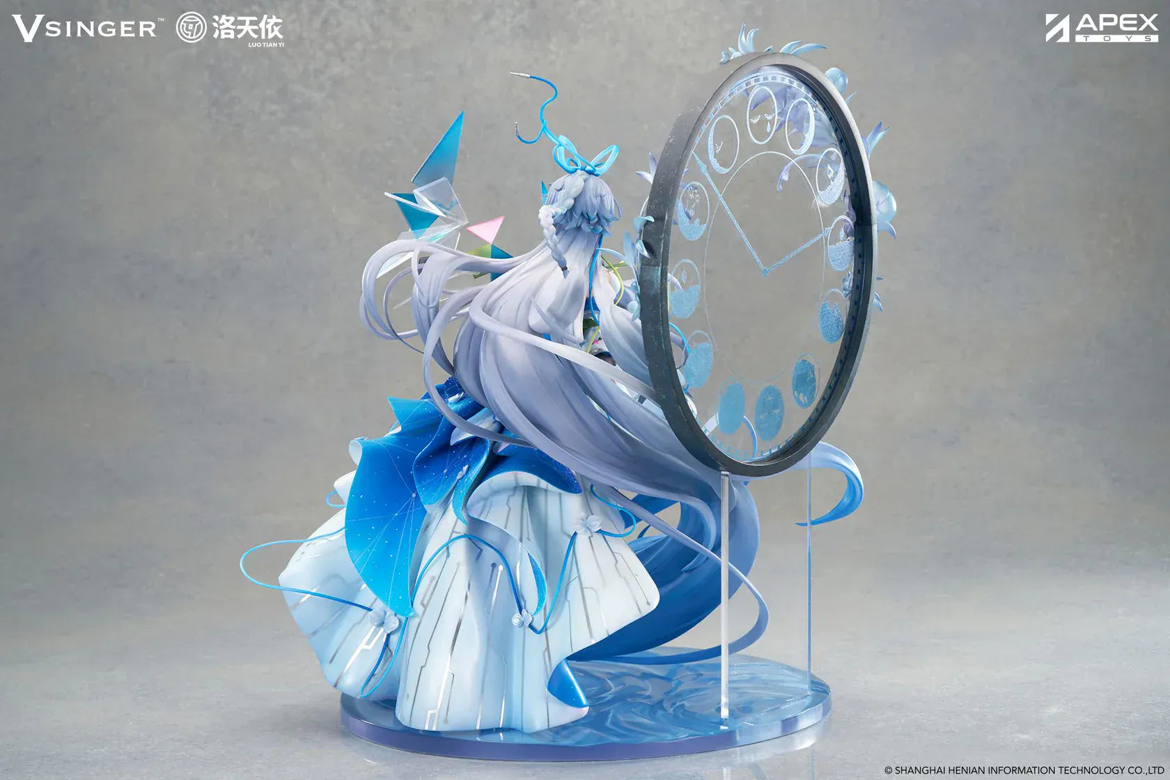 Vsinger Luo Tianyi 12th Anniversary 1/7 scale figure featuring flowing twin tails, layered blue and white dress, and ornate circular backdrop