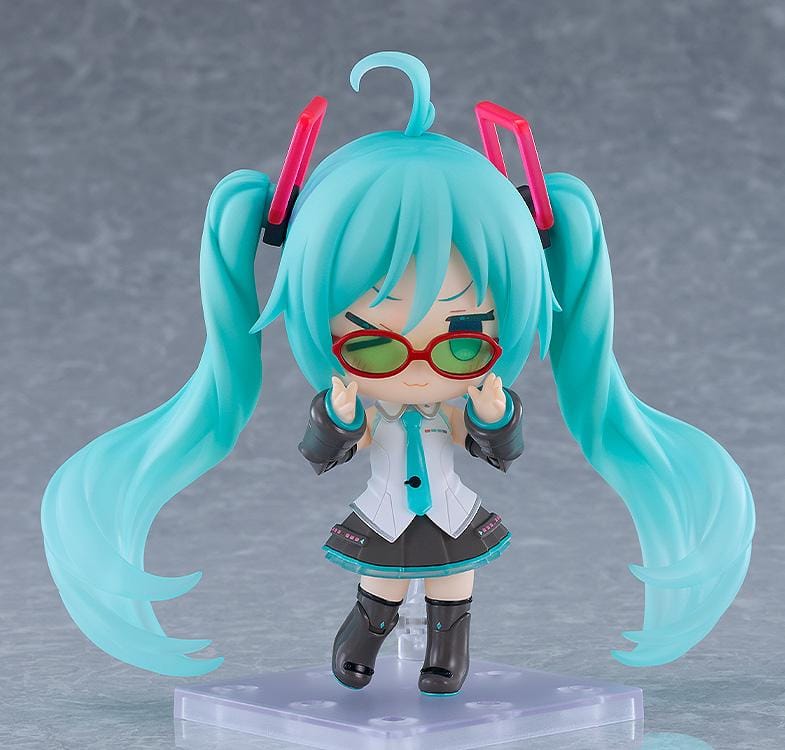 Hatsune Miku Nendoroid Hatsune Miku HMO Ver. Figure featuring Miku with teal twin tails, red glasses, colorful cable-style hair accessories, and music-inspired outfit details.