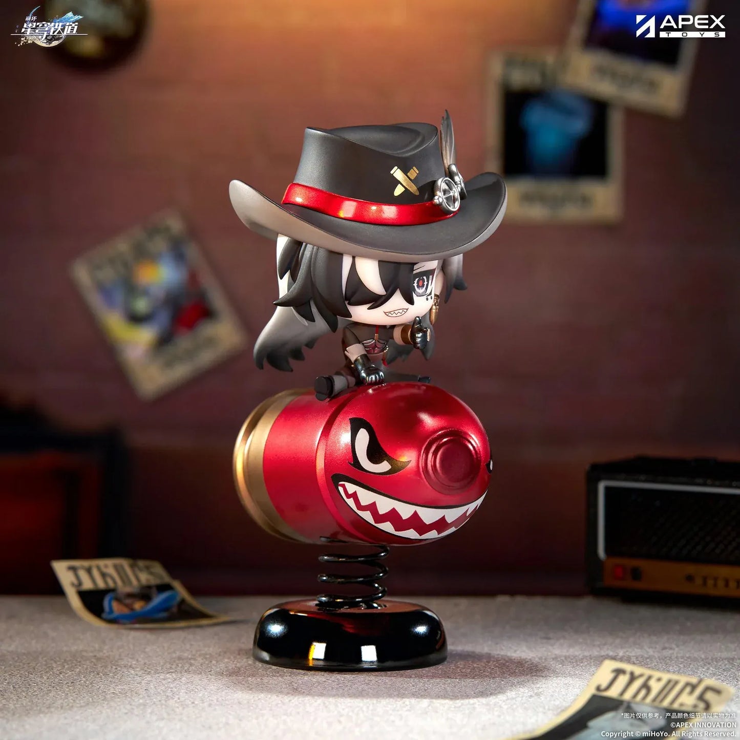 Honkai Star Rail Happy Shake Boothill Chibi Figure sitting on a red spring-mounted rocking base with his signature cowboy hat
