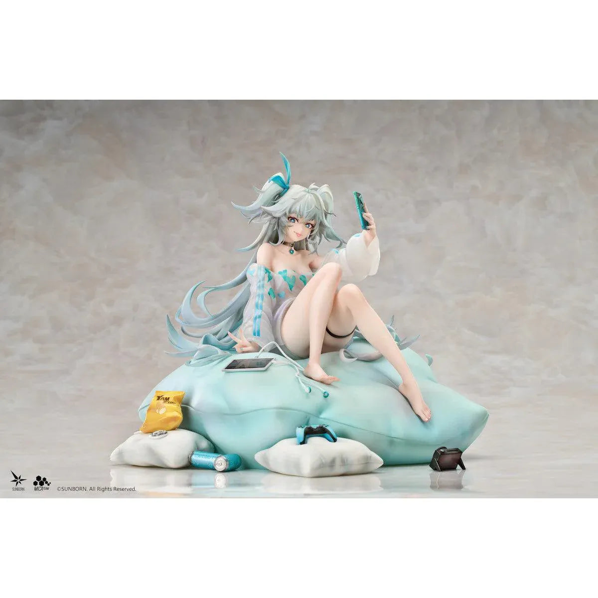 Girls' Frontline 2 Exilium Florence Marvellous Herb Cake Ver. 1/7 Scale Figure seated on a cushion with mint hair, phone accessory, pillows, snacks, and game controller details