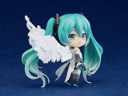 Hatsune Miku Happy 16th Birthday Ver. Nendoroid figure with turquoise twin-tails, white outfit, microphone, and translucent wings