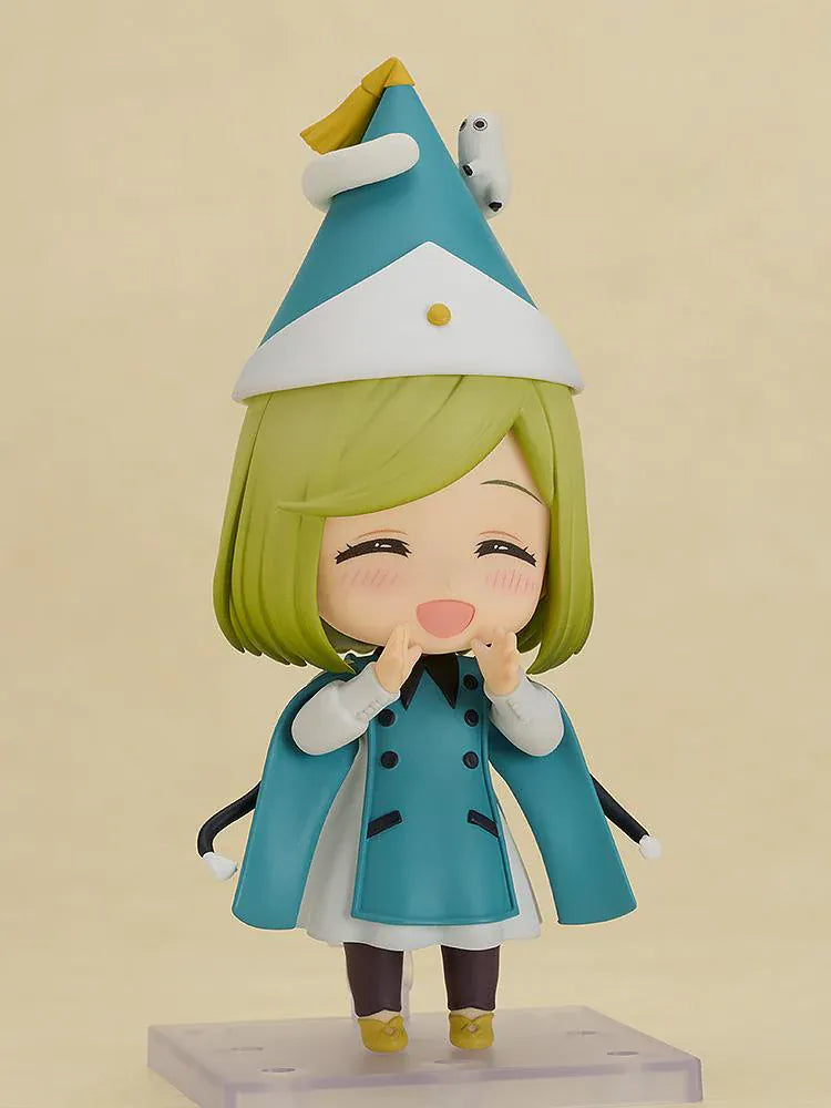 Nendoroid Coco figure from Witch Hat Atelier wearing witch hat and teal outfit in chibi style