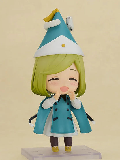 Nendoroid Coco figure from Witch Hat Atelier wearing witch hat and teal outfit in chibi style