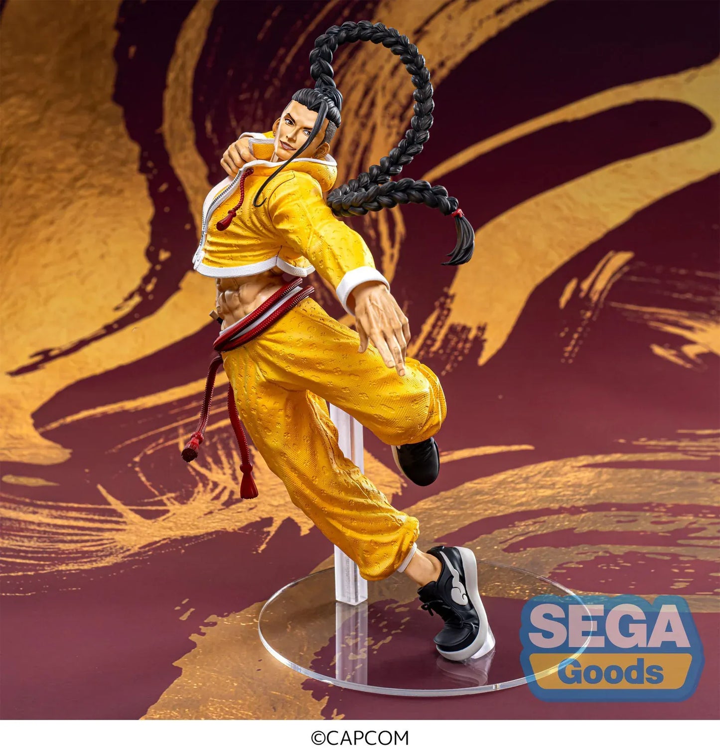 Street Fighter 6 FiGURiZMa Jamie figure in a dynamic martial arts pose with signature yellow outfit and braided hair