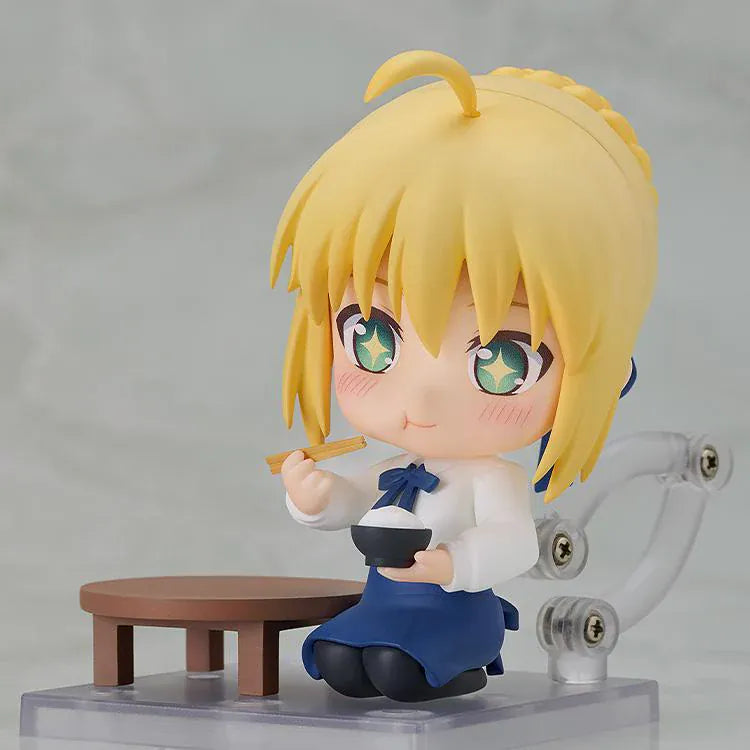 Fate stay night Nendoroid Saber Casual Outfit Ver. Figure featuring Saber with blonde hair, green eyes, white blouse, blue skirt, and sword accessory.