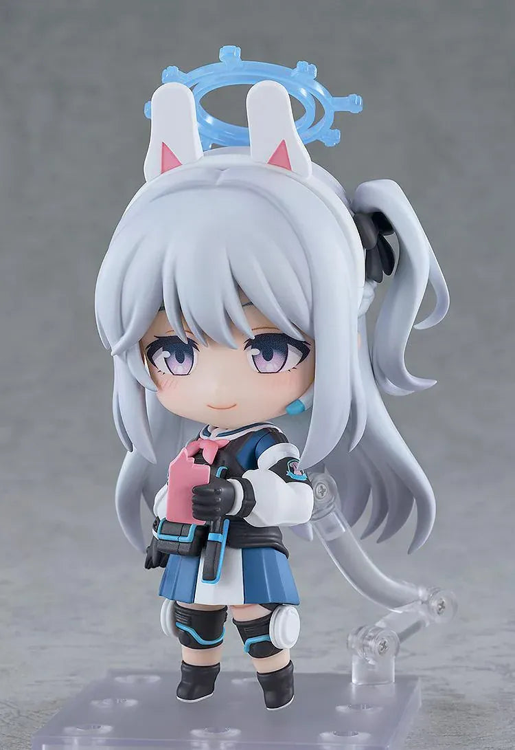 Blue Archive Nendoroid Miyako Tsukiyuki with silver hair, rabbit-ear headband, blue halo, white jacket, blue skirt, and black tactical gear.