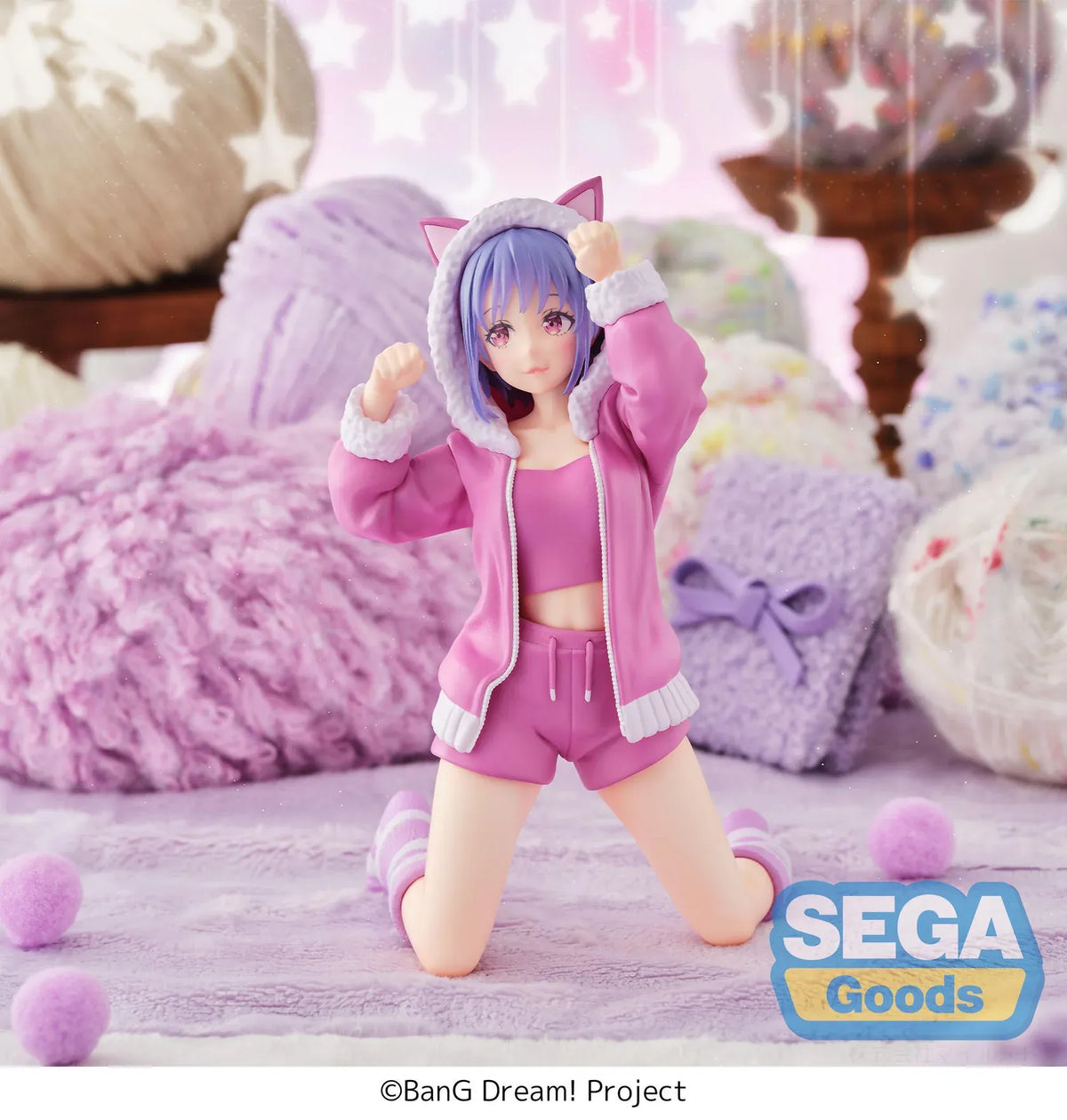 BanG Dream! Nyamu Yutenji Pajama Party figure kneeling in pink pajamas with a cat-ear hood, purple hair, striped socks, and both hands raised.