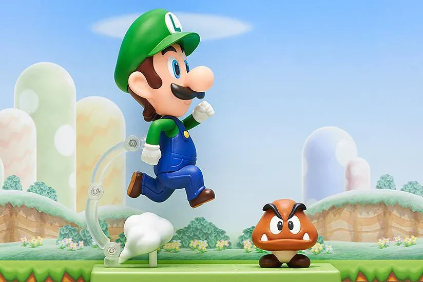 Super Mario Nendoroid Luigi figure wearing his green hat and blue overalls in a running pose