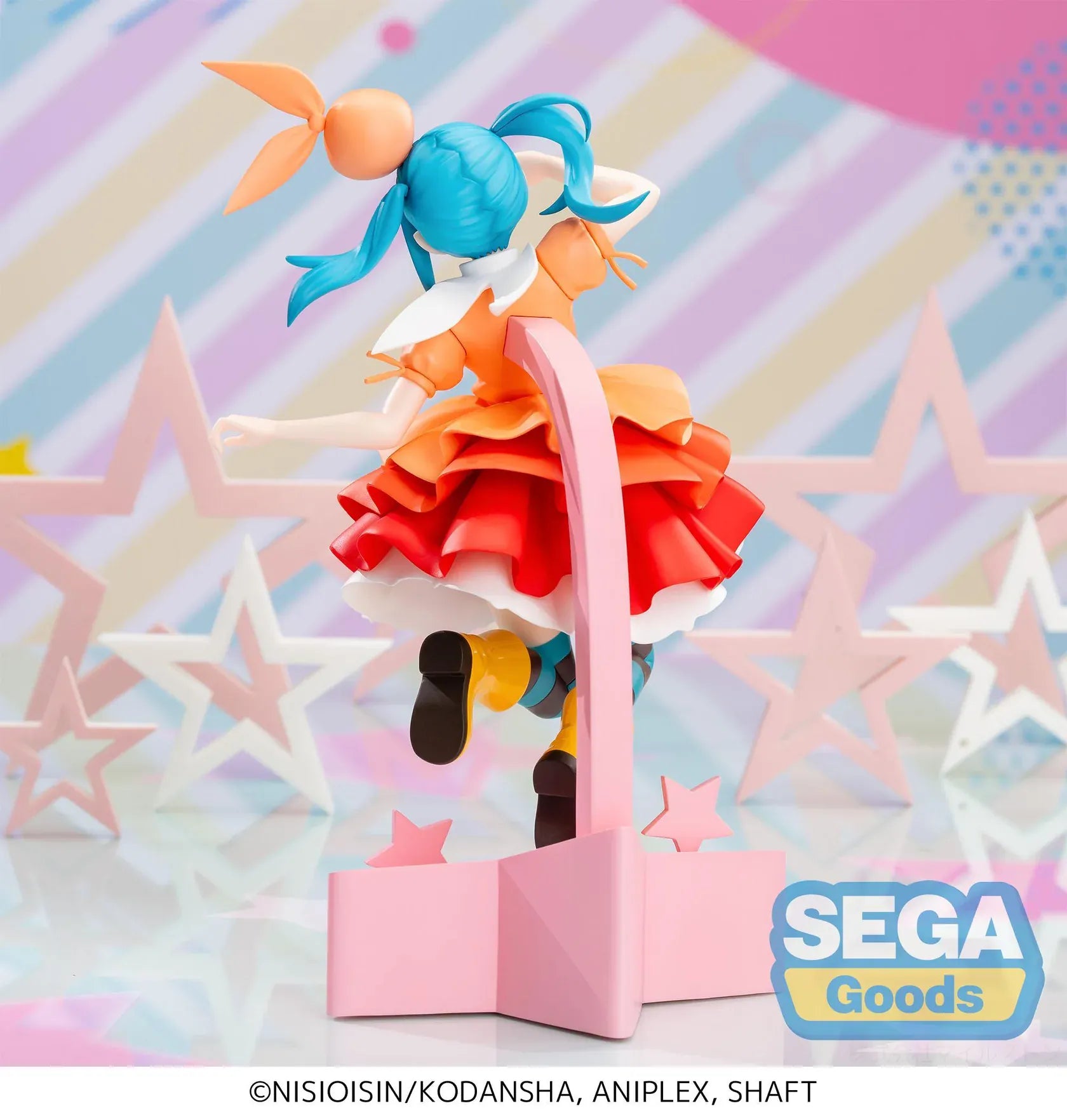 Monogatari XStellar Yotsugi Ononoki Figure with blue-green hair, orange and red outfit, and pink star display base