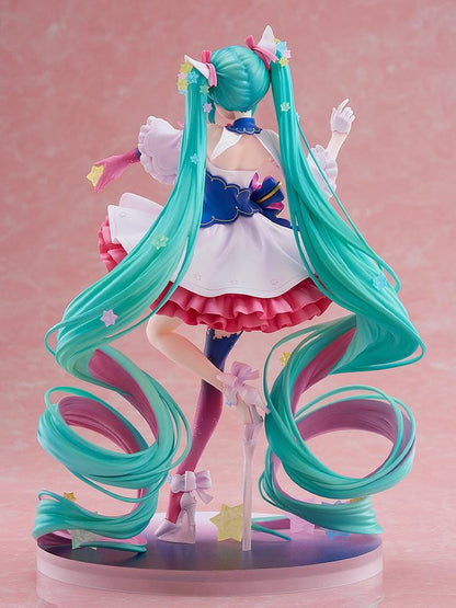 Hatsune Miku Rosuuri Ver. 1/7 scale figure with swirling turquoise twin tails, colorful stars, a pink and white ruffled dress, and a blue bow.