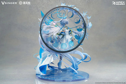Vsinger Luo Tianyi 12th Anniversary 1/7 scale figure featuring flowing twin tails, layered blue and white dress, and ornate circular backdrop
